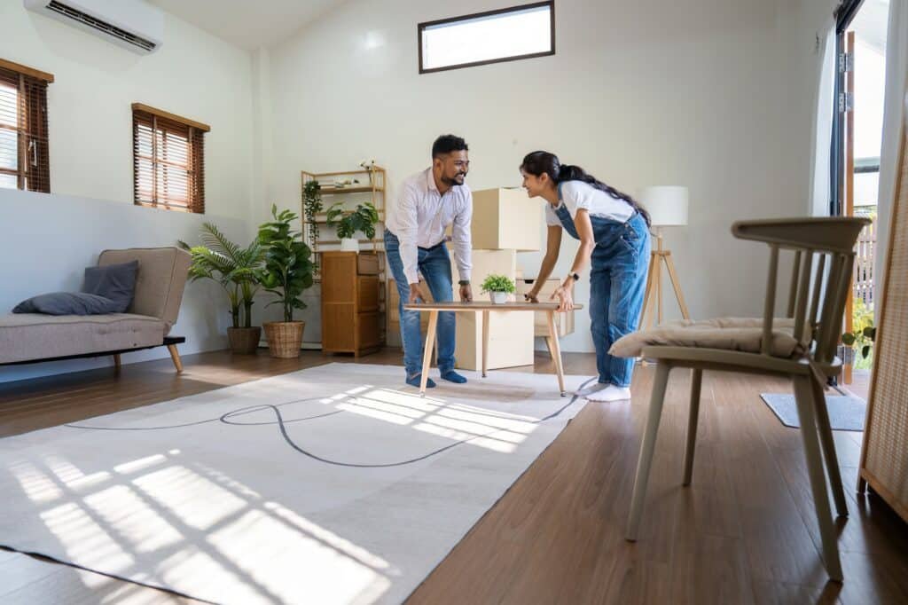 Married couple moving in new property bought together on mortgage loan